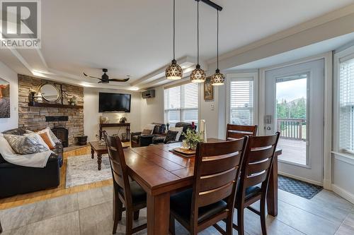 47 Western Island Pond Drive, Torbay, NL - Indoor Photo Showing Dining Room With Fireplace