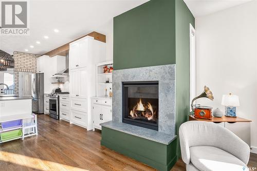 551 Fast Way, Saskatoon, SK - Indoor Photo Showing Living Room With Fireplace