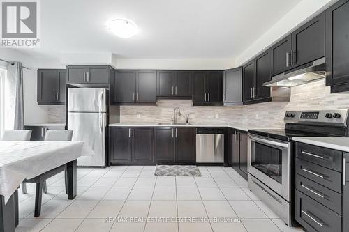 127 - 1000 Asleton Boulevard, Milton, ON - Indoor Photo Showing Kitchen With Stainless Steel Kitchen With Upgraded Kitchen