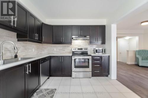 127 - 1000 Asleton Boulevard, Milton, ON - Indoor Photo Showing Kitchen With Stainless Steel Kitchen With Upgraded Kitchen