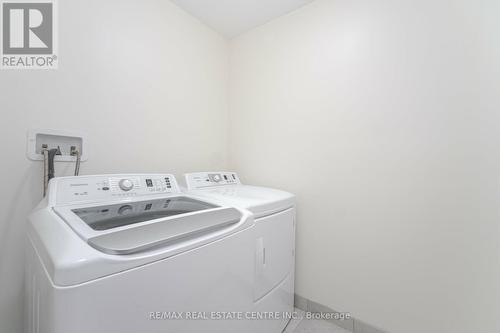 127 - 1000 Asleton Boulevard, Milton, ON - Indoor Photo Showing Laundry Room