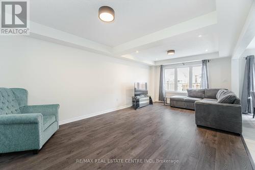 127 - 1000 Asleton Boulevard, Milton, ON - Indoor Photo Showing Living Room