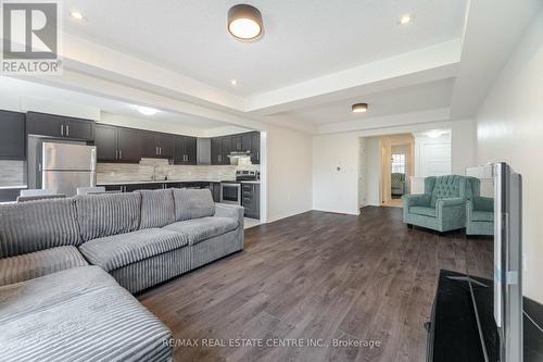 127 - 1000 Asleton Boulevard, Milton, ON - Indoor Photo Showing Living Room