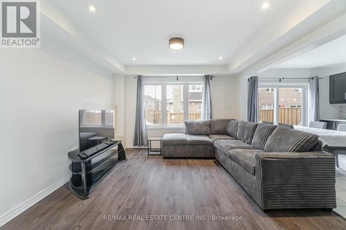 127 - 1000 Asleton Boulevard, Milton, ON - Indoor Photo Showing Living Room