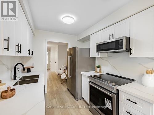 74 Mare Crescent, Toronto, ON - Indoor Photo Showing Kitchen With Double Sink