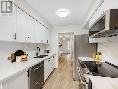 74 Mare Crescent, Toronto, ON - Indoor Photo Showing Kitchen With Double Sink