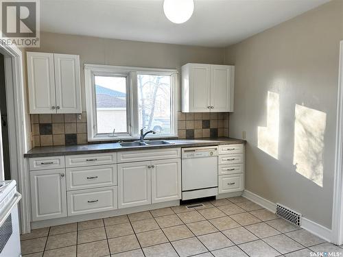 251 22Nd Street W, Battleford, SK - Indoor Photo Showing Kitchen With Double Sink