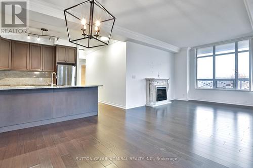 212 - 9235 Jane Street, Vaughan, ON - Indoor With Fireplace