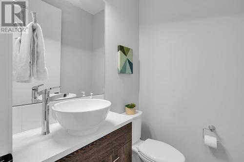 Main floor half bathroom - 1933 Ethel Street, Kelowna, BC - Indoor Photo Showing Bathroom