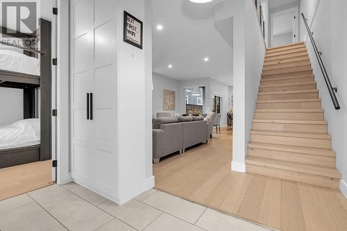 Hardwood flooring throughout the main floor - 1933 Ethel Street, Kelowna, BC - Indoor Photo Showing Other Room