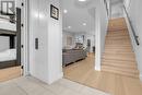 Hardwood flooring throughout the main floor - 1933 Ethel Street, Kelowna, BC  - Indoor Photo Showing Other Room 