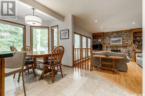 314 Braeside Court, Saskatoon, SK - Indoor Photo Showing Dining Room With Fireplace