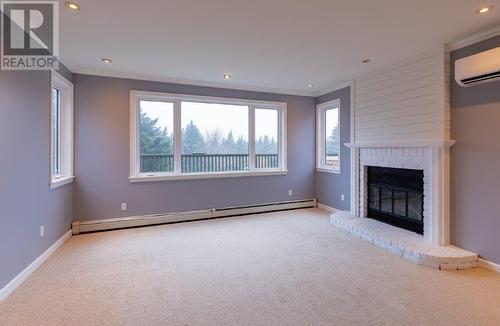 29 Red Cliff Road, Logy Bay Middle Cove Outer Cove, NL - Indoor With Fireplace