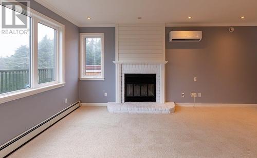 29 Red Cliff Road, Logy Bay Middle Cove Outer Cove, NL - Indoor Photo Showing Other Room With Fireplace