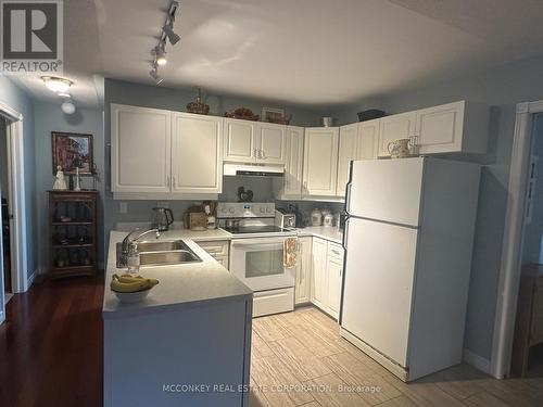 8 - 300 Franmor Drive, Peterborough (Ashburnham), ON - Indoor Photo Showing Kitchen With Double Sink