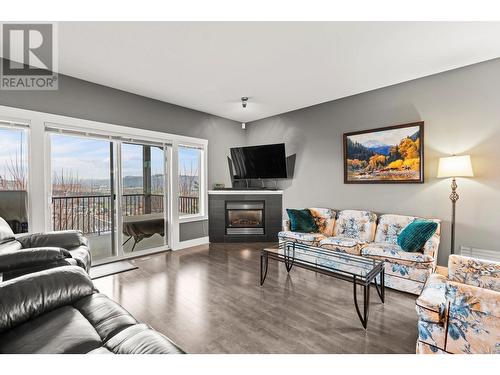 995 Mt. Ida Drive Unit# 12, Vernon, BC - Indoor Photo Showing Living Room With Fireplace