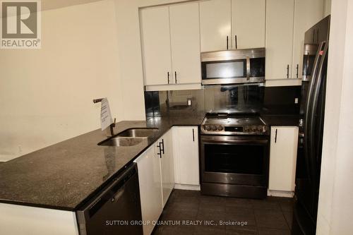 1610 - 70 Absolute Avenue, Mississauga, ON - Indoor Photo Showing Kitchen With Double Sink