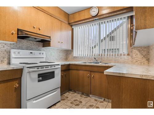 12020 85 St Nw Nw, Edmonton, AB - Indoor Photo Showing Kitchen With Double Sink