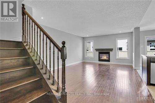 208 Mission Trail Crescent, Ottawa, ON - Indoor Photo Showing Living Room With Fireplace