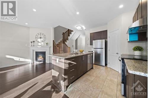 610 Vivera Place, Ottawa, ON - Indoor Photo Showing Kitchen With Fireplace