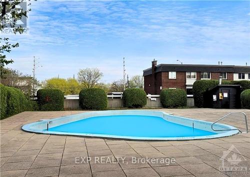 8 - 1821 Walkley Road, Ottawa, ON - Outdoor With In Ground Pool With Backyard