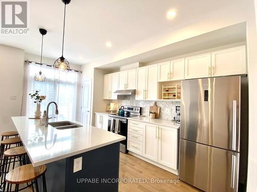 78 Gardenpost Terrace, Ottawa, ON - Indoor Photo Showing Kitchen With Stainless Steel Kitchen With Double Sink With Upgraded Kitchen