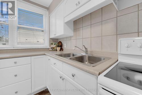 14 Walter Avenue S, Hamilton, ON - Indoor Photo Showing Kitchen With Double Sink