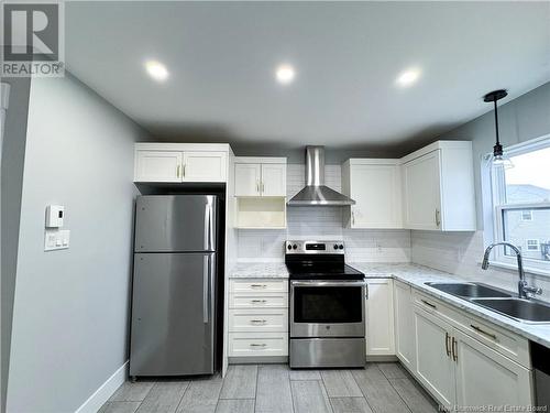 56 Des Peupliers Street, Dieppe, NB - Indoor Photo Showing Kitchen With Stainless Steel Kitchen With Double Sink