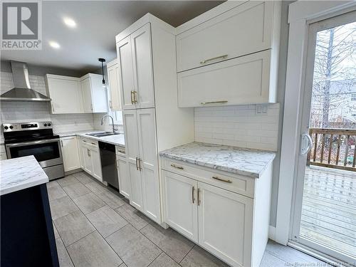 56 Des Peupliers Street, Dieppe, NB - Indoor Photo Showing Kitchen With Double Sink