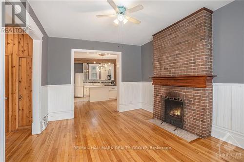 128 Flora Street, Ottawa, ON - Indoor Photo Showing Living Room With Fireplace