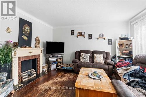 2418 Carlsen Avenue, Ottawa, ON - Indoor Photo Showing Living Room With Fireplace