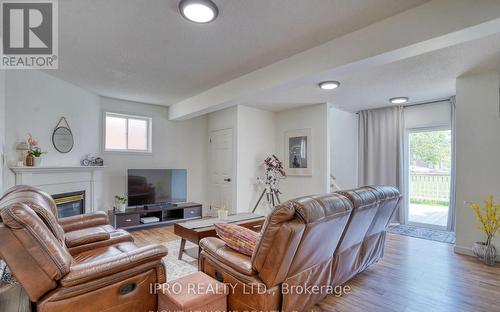 Bsmt - 604 Woodmount Crescent, Oshawa, ON - Indoor Photo Showing Living Room With Fireplace