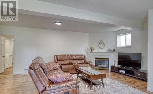 Bsmt - 604 Woodmount Crescent, Oshawa, ON - Indoor Photo Showing Living Room With Fireplace