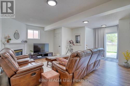 Bsmt - 604 Woodmount Crescent, Oshawa, ON - Indoor Photo Showing Living Room With Fireplace