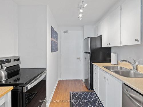 1104-581 Avenue Rd, Toronto, ON - Indoor Photo Showing Kitchen With Double Sink