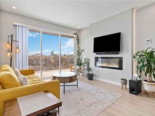 211-967 Whirlaway Cres, Langford, BC - Indoor Photo Showing Living Room With Fireplace