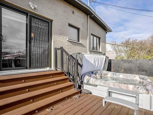 Back facade - 475 Rue De Canterbury, Laval (Chomedey), QC - Outdoor With Deck Patio Veranda With Exterior