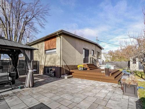 Back facade - 475 Rue De Canterbury, Laval (Chomedey), QC - Outdoor With Deck Patio Veranda With Exterior