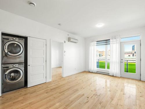 View - 405-440 Rue De La Gauchetière E., Montréal (Ville-Marie), QC - Indoor Photo Showing Laundry Room