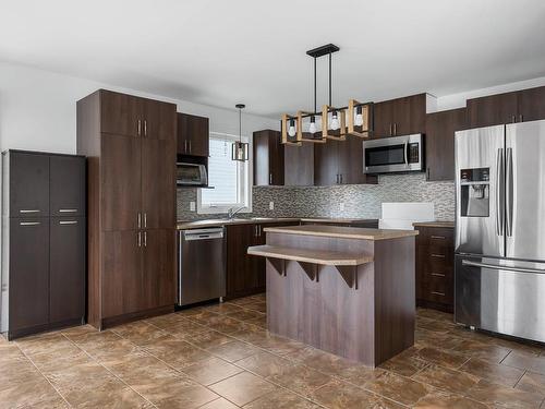 Cuisine - 404 Rue Thérèse, L'Île-Perrot, QC - Indoor Photo Showing Kitchen With Upgraded Kitchen