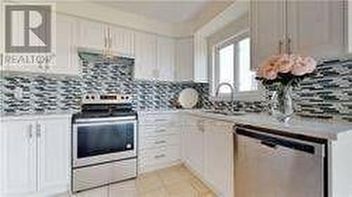 144 - 4950 Albina Way, Mississauga, ON - Indoor Photo Showing Kitchen With Upgraded Kitchen