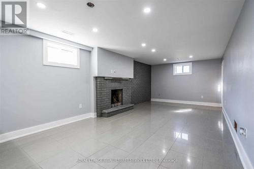 Lower - 4 Mallard Crescent, Brampton, ON - Indoor Photo Showing Basement With Fireplace