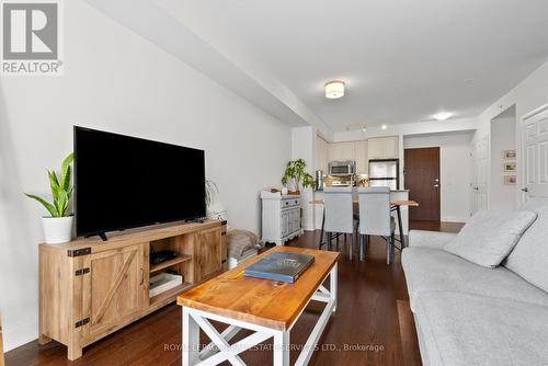 208 - 2480 Prince Michael Drive, Oakville, ON - Indoor Photo Showing Living Room