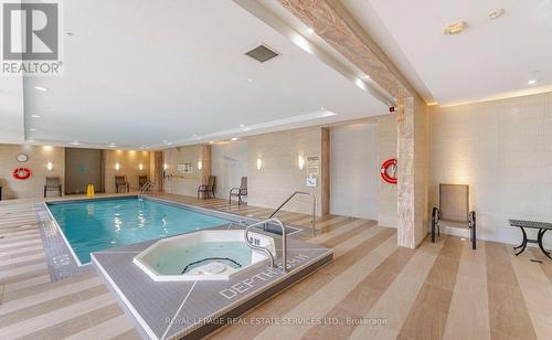 208 - 2480 Prince Michael Drive, Oakville, ON - Indoor Photo Showing Other Room With In Ground Pool