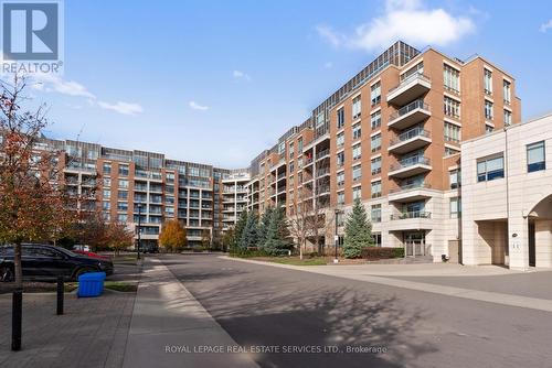 208 - 2480 Prince Michael Drive, Oakville, ON - Outdoor With Balcony With Facade