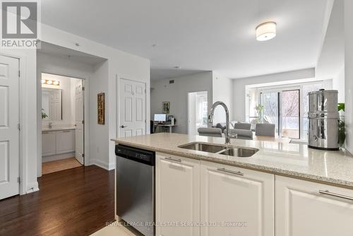 208 - 2480 Prince Michael Drive, Oakville, ON - Indoor Photo Showing Kitchen With Double Sink