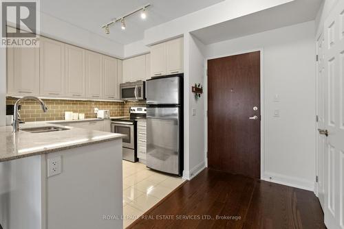 208 - 2480 Prince Michael Drive, Oakville, ON - Indoor Photo Showing Kitchen With Stainless Steel Kitchen With Double Sink