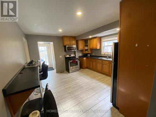 3161 Peter Street, Windsor, ON - Indoor Photo Showing Kitchen With Double Sink