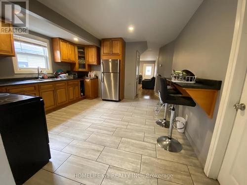 3161 Peter Street, Windsor, ON - Indoor Photo Showing Kitchen With Double Sink