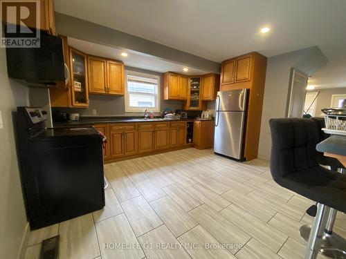 3161 Peter Street, Windsor, ON - Indoor Photo Showing Kitchen With Double Sink